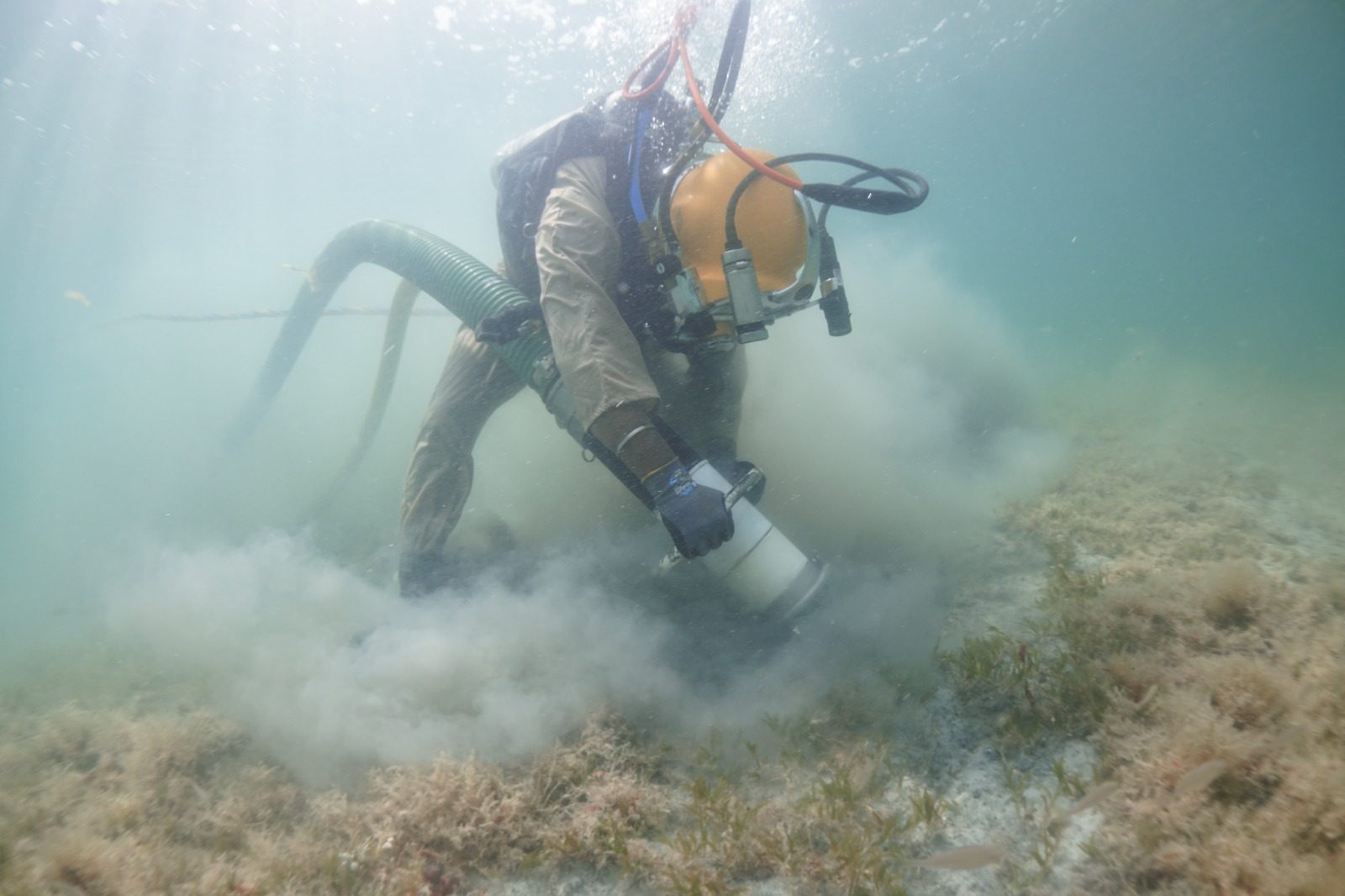 HDS diver operating the super stream dredging system on the seabed